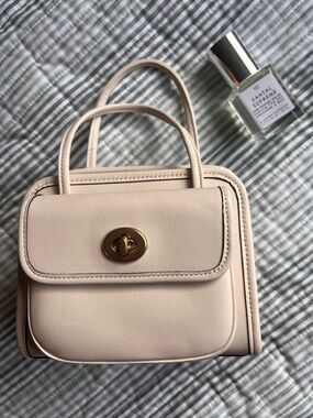 Coach Turn-lock Mini Bag